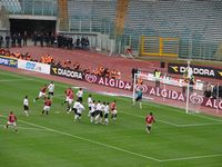 Punizione
                  di Totti parata dal portiere Campagnolo